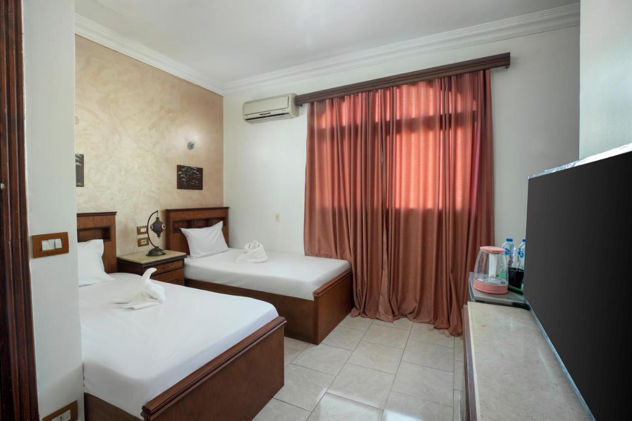Pyramids Inn Hotel Kafrat al Jabal Exterior photo