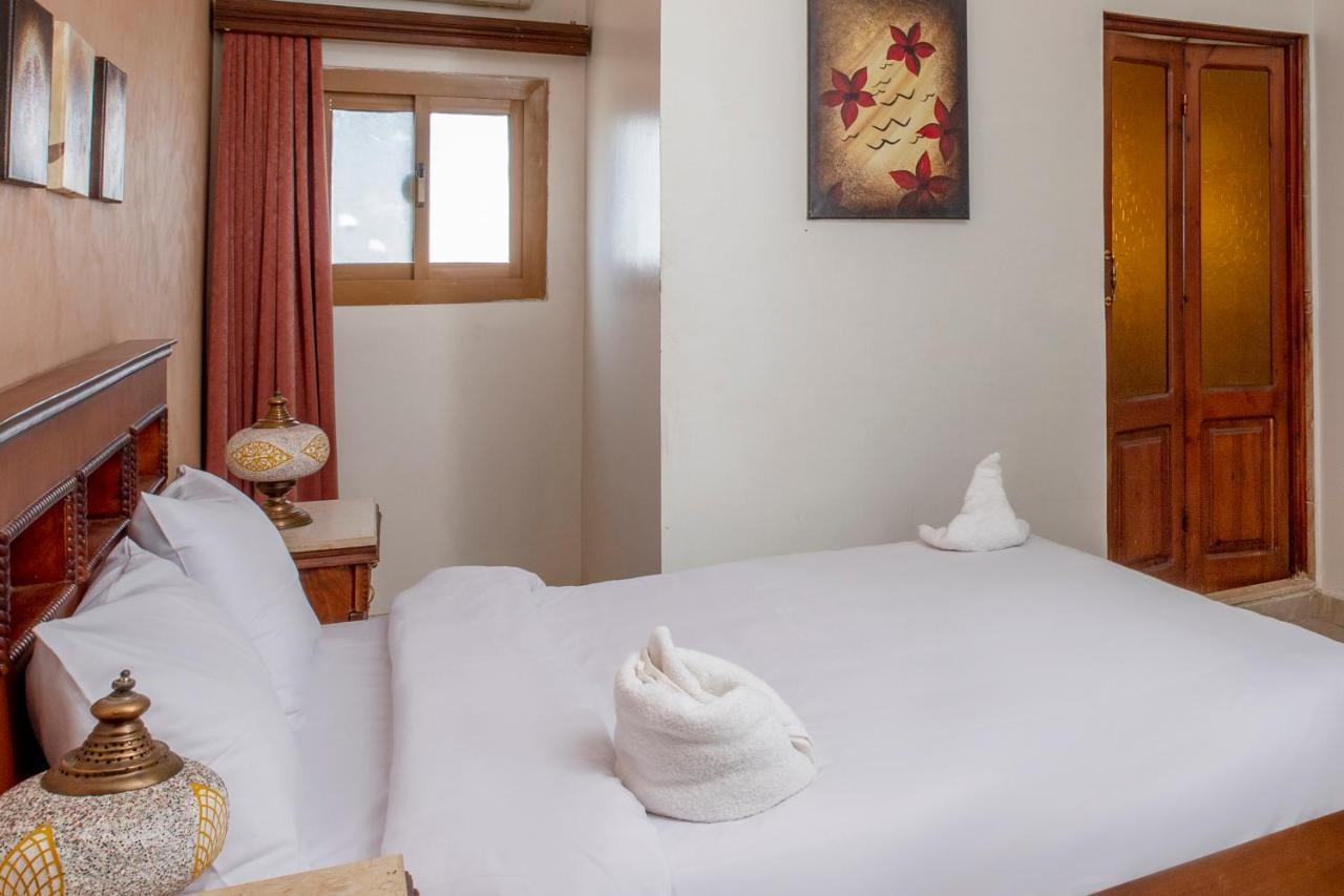 Pyramids Inn Hotel Kafrat al Jabal Exterior photo