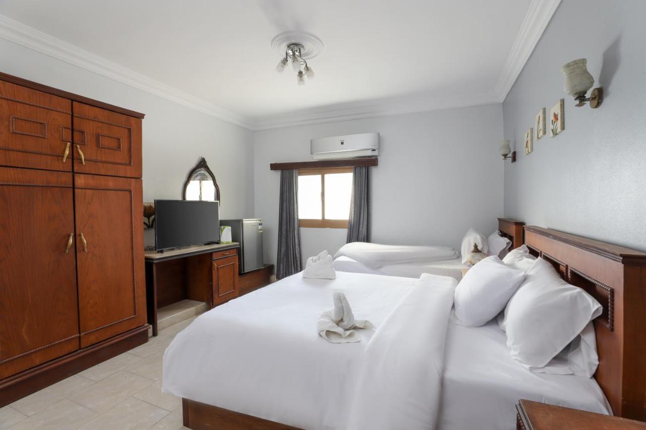 Pyramids Inn Hotel Kafrat al Jabal Exterior photo